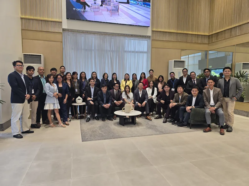 Team Elite sales group photographed together at the 7F open lounge showroom display