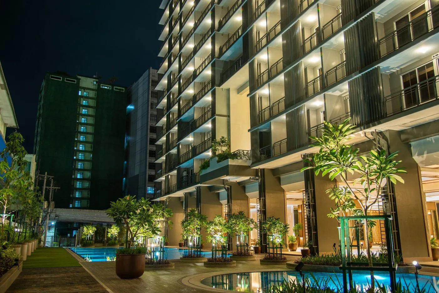 The Oriana pool and amenity deck glowing at night
